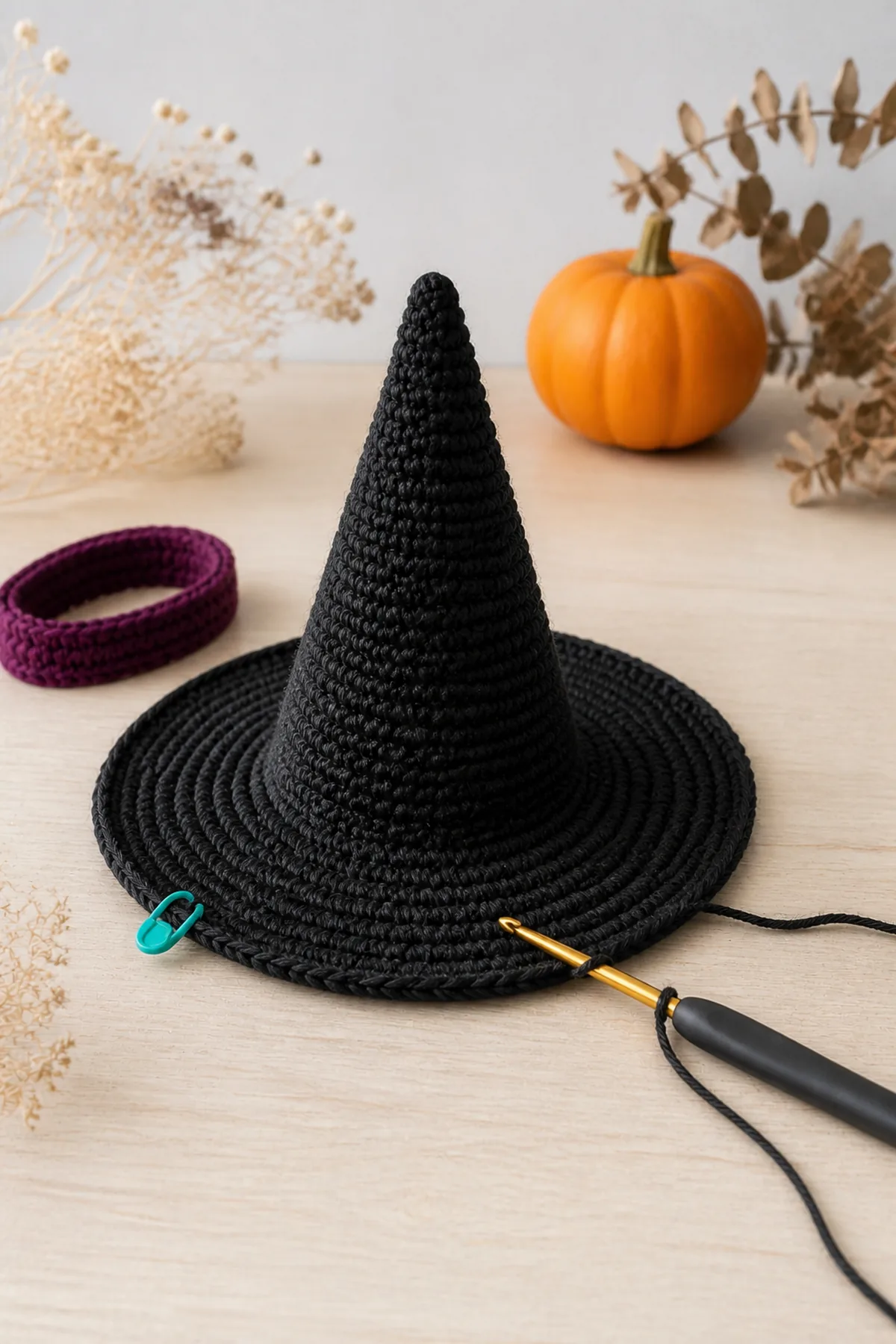 Mini witch-hat cone with flat brim rounds underway and plum band nearby