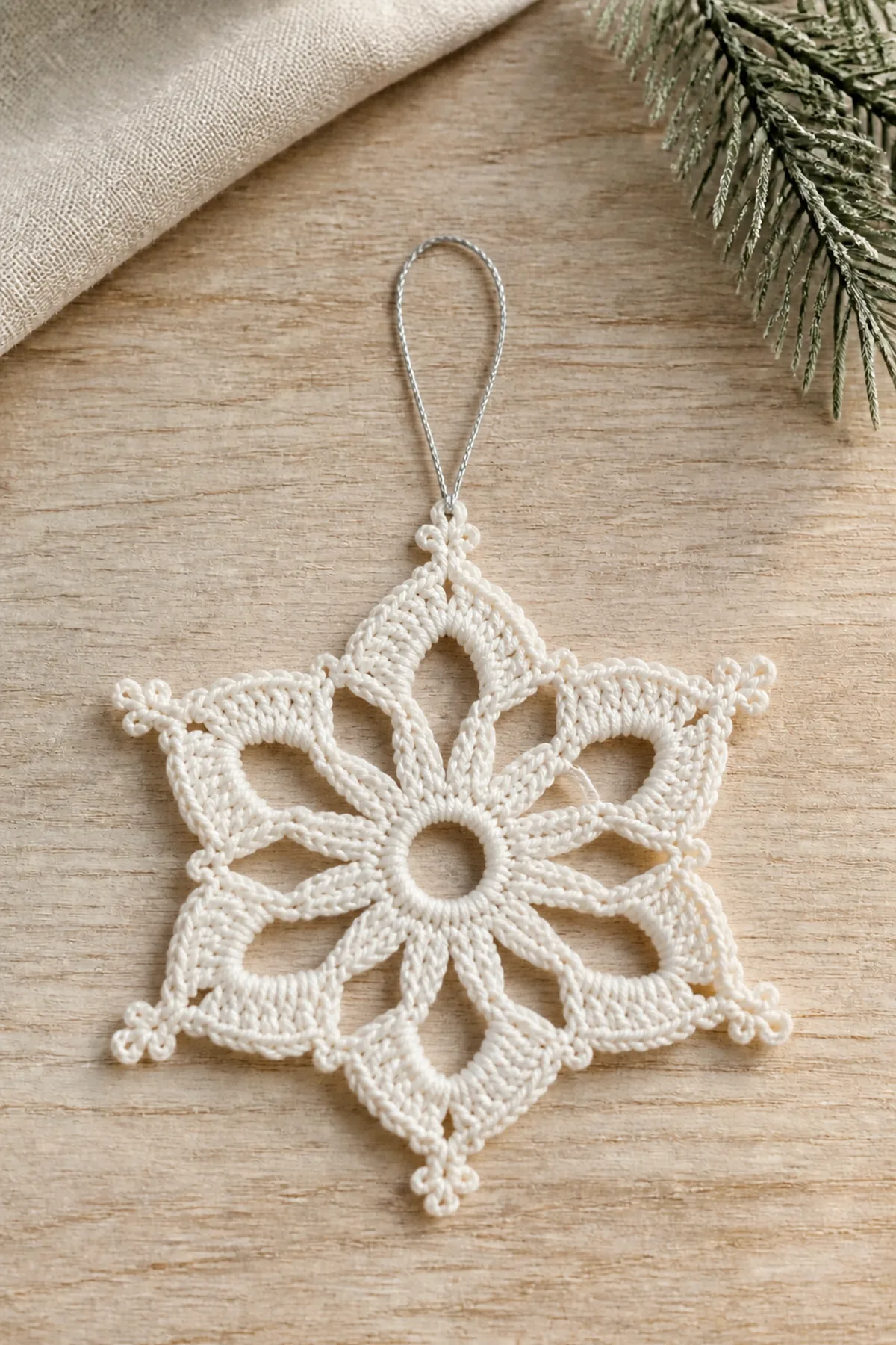 Early construction stage of the crochet snowflake ornament